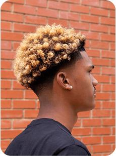 Man with curly blonde hair